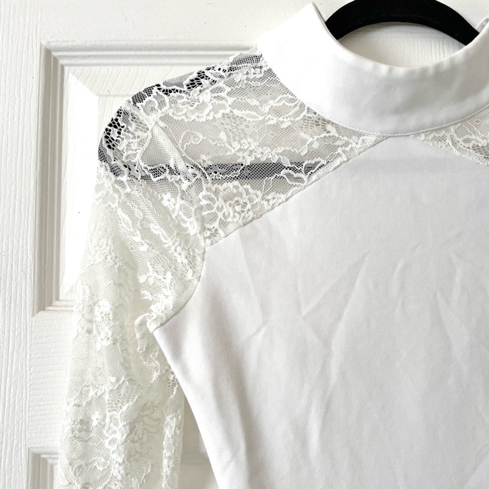 Bebe White Lace Bodysuit. Size XXS.